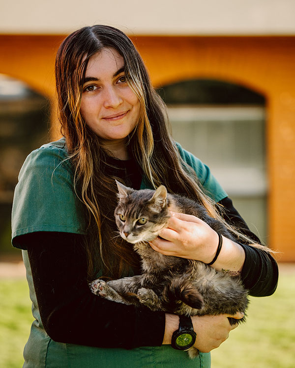 Hope holding a cat